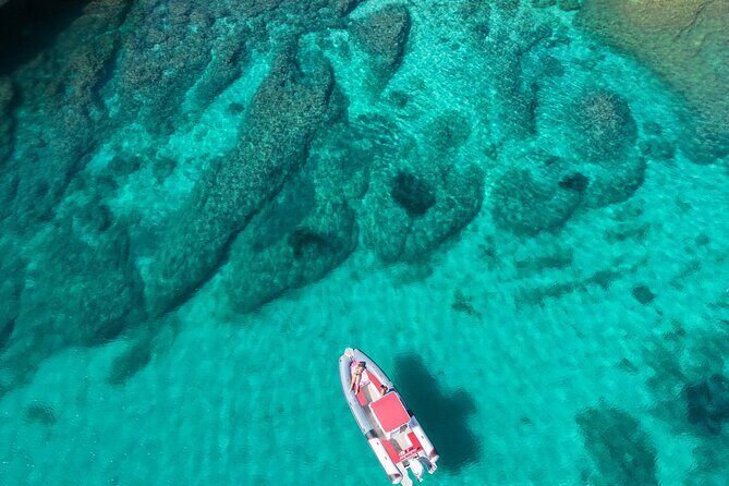 3 Hours Guided Dinghy Tour: Cagliari, Caves and Sella del Diavolo - Stop 4: Sella del Diavolo cove for turquoise water and photos