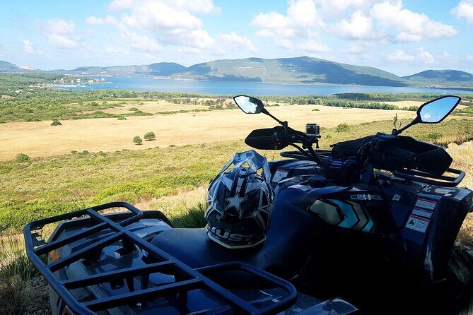Alghero: 4-hour quad tour - Porto Ferro: Towers, forts, coves, and the swim stop