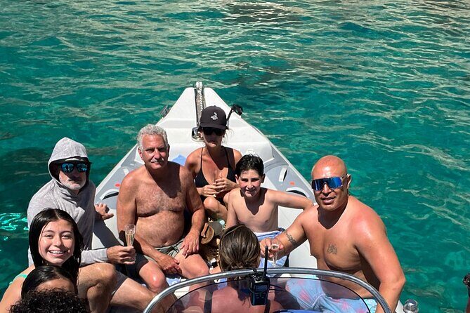 Boat excursion from Marina Piccola Cagliari with aperitif - The Cove Route: Sella del Diavolo and the Beaches You Reach by Boat