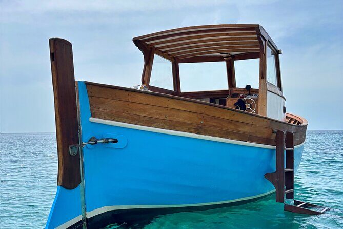 Cagliari Sea Experience : A High-Quality Tour of the Sardinian Sea - The aperitif at sea: Sardinian snacks, wine, and music onboard
