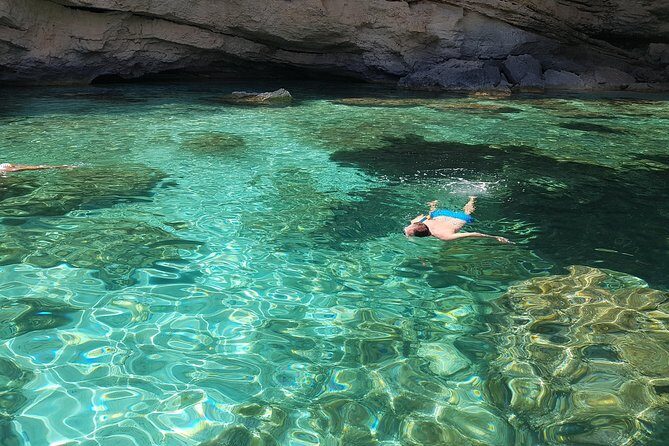 Catamaran Day Trip to the Cale di Orosei with Lunch - Cala Goloritze: the star beach stop for swimming and snorkeling