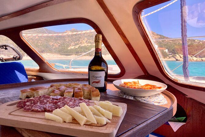 Daily cruise on a sailing catamaran on the La Maddalena archipelago - The last stop: relax, explore, and keep an eye out for dolphins