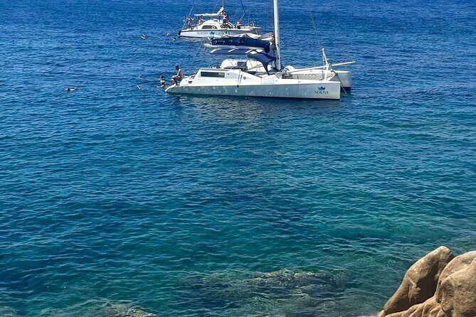 Daily cruise on a sailing catamaran on the La Maddalena archipelago - Food and drinks on board: Sardinian aperitifs, spaghetti lunch, wine, water