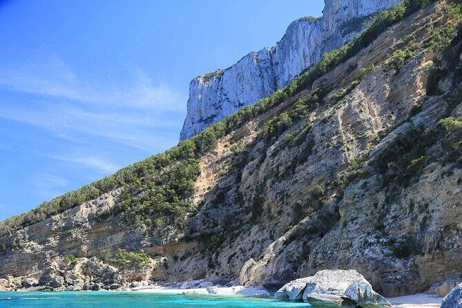 Day trip in the Gulf of Orosei Cala Mariolu - Ogliastra Coast Sights on the Way Out: Pedra Longa and the Grotto of the Doves