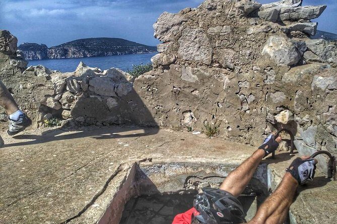 E-bike Excursion at Natural Park of Porto Conte - Punta Giglio - E-MTB Adventure - Guides make the difference: Emanuele, Miguelle, and Francesco in the mix