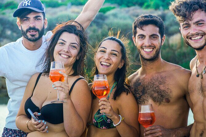 Fantastic sunset excursion by boat to the Devil's saddle - Stop 1: Calamosca Beach and the aperitif moment
