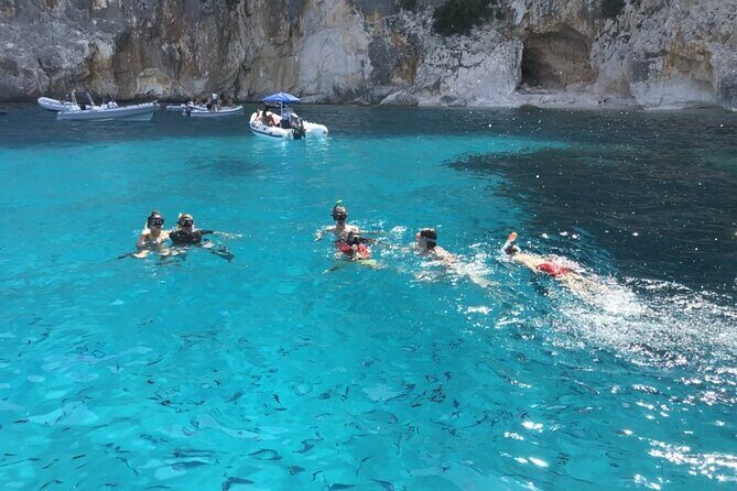 From Cala Gonone: Dinghy trip in the Gulf of Orosei - Piscine di Venere: the turquoise water trick that makes boats look like they float