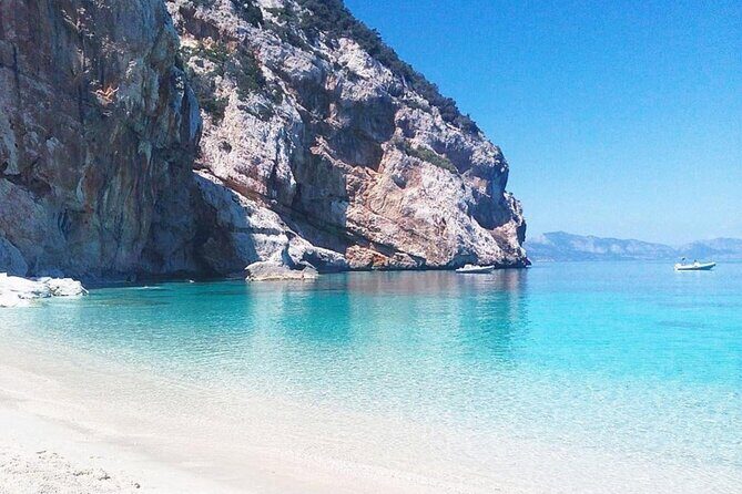 From Cala Gonone: Dinghy trip in the Gulf of Orosei - Cala Sisine: the longest shore stop for pebbles, pink-and-white tones, and greenery