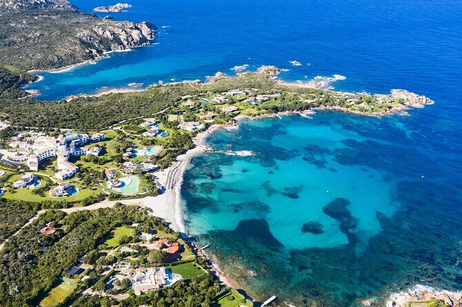 From Porto Rotondo: dinghy tour of Porto Cervo's beaches - Stop 1: Capriccioli Beach (30 Minutes)