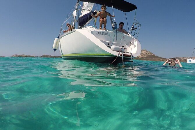 From Stintino: sailboat tour to Asinara with lunch - Lunch on Board: Seafood, Wine, Coffee, and Local Liqueur