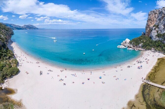 Full Day Cala Gonone and Gulf of Orosei Mini Cruise - Cala Sisine: the white pebble beach and steep cliff backdrop