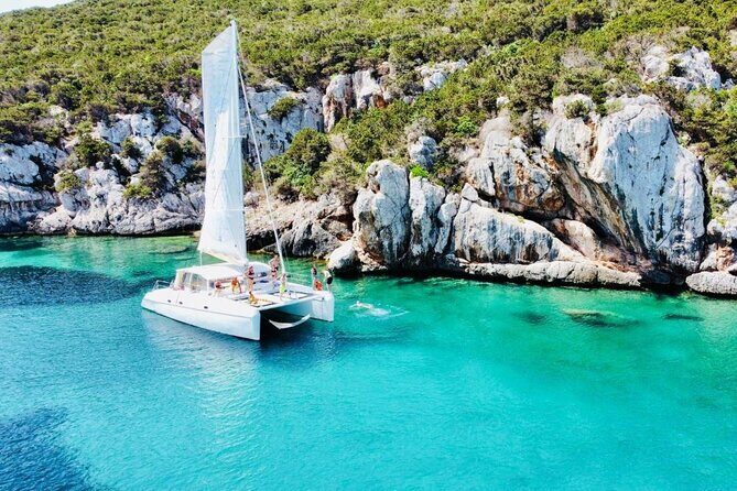 Full day Catamaran cruise in Porto Conte Natural Park - Snorkeling gear, paddle board, and getting the most out of each swim break