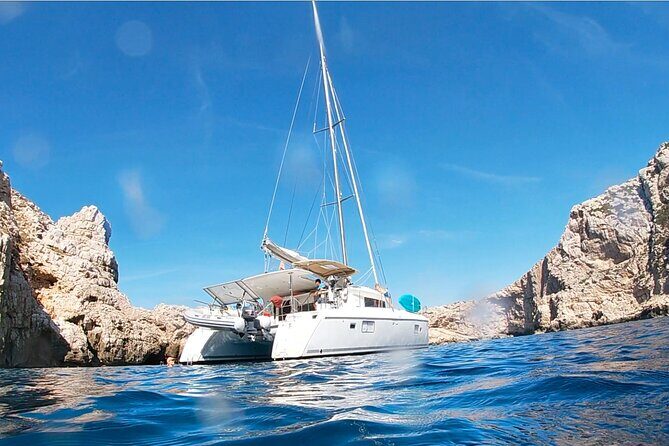 Full day catamaran tour in Alghero - Masks, fins, and reading the water from the catamaran