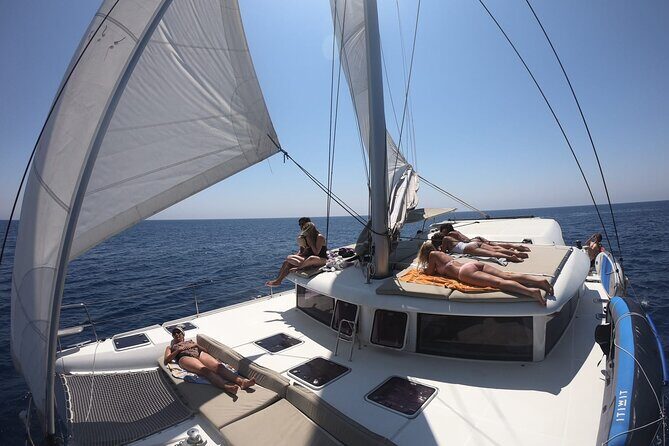 Full day catamaran tour in Alghero - Capo Caccia cliffs to Neptune caves and Foradada island