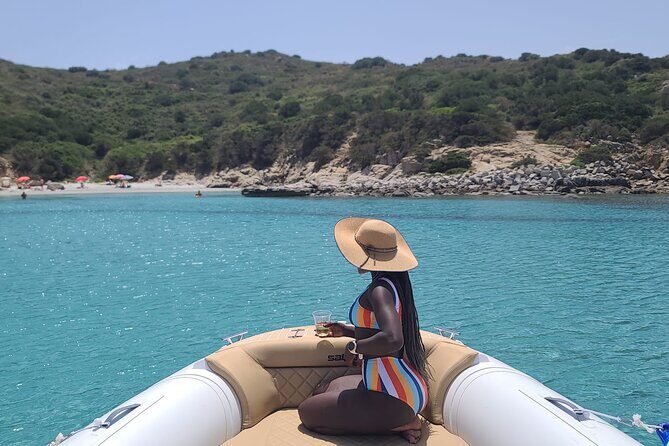 Get your Boat Tour with PRISCILLA to the best Cagliari Coves". - Onboard Commentary: Gianni and the Captain Make It More Than Just a Ride