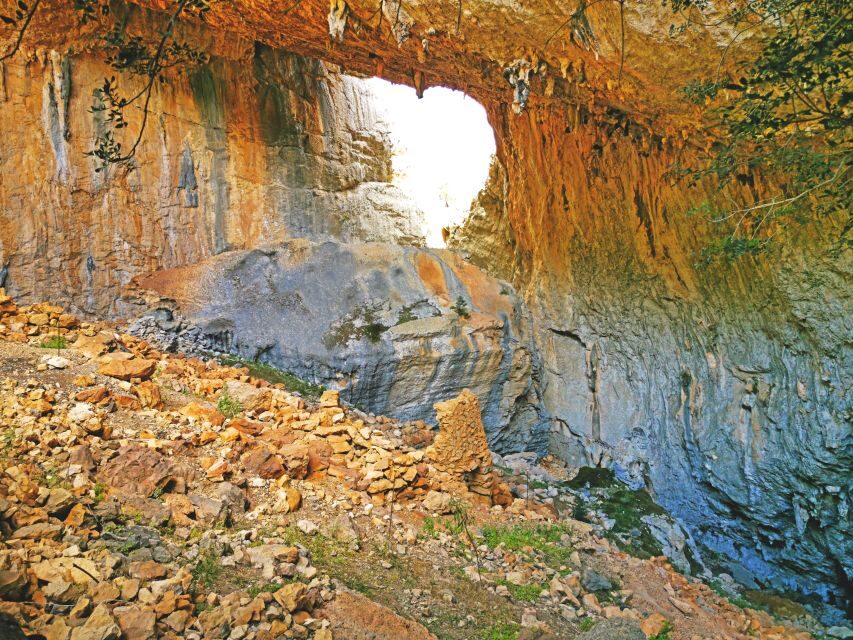 Orosei-Dorgali-Oliena: Hike to nuragic village of Tiscali - Entering the Rocky Cave: Nuragic Village Ruins at Tiscali