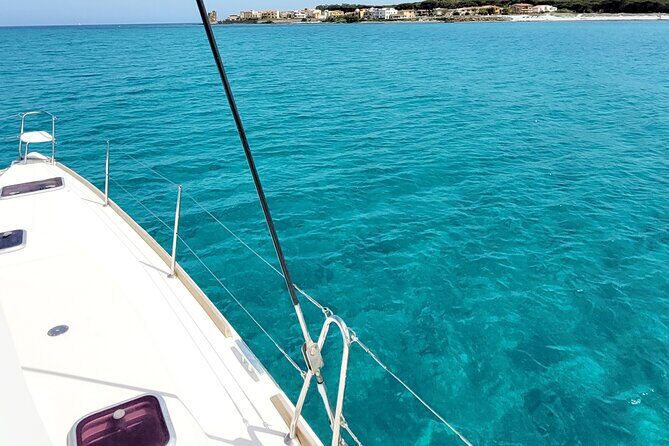 Private catamaran sailing trip around La Caletta -Berchida - Sardinia - Stop 3: Spiaggia di Capo Comino and why this stop matters