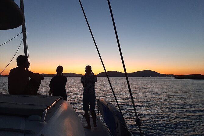 unique aperitif experience at sunset on a catamaran - The Start: A Smooth Sail Along Alghero’s Medieval Walls