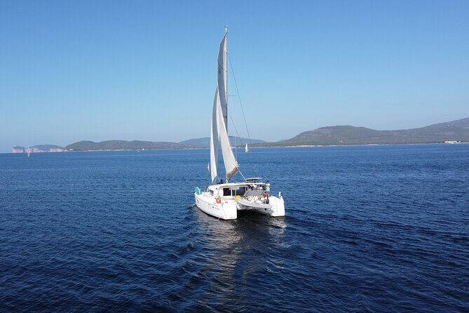 unique aperitif experience at sunset on a catamaran - The Aperitif Moment: Local Wine, Appetizers, and Music at Anchor