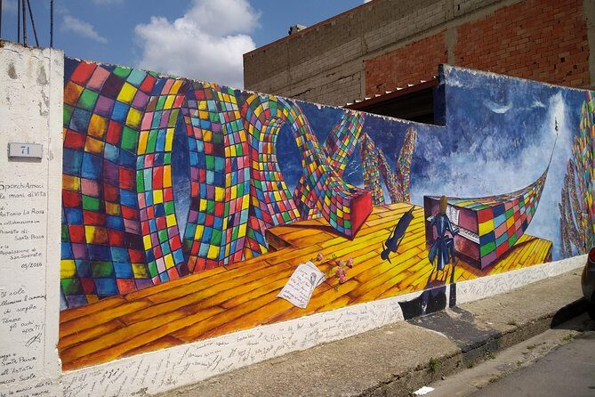 Visit a typical village in Sardinia, Excursion from Cagliari - What you’ll actually see: murals, sculptures, and the village’s art-story connection